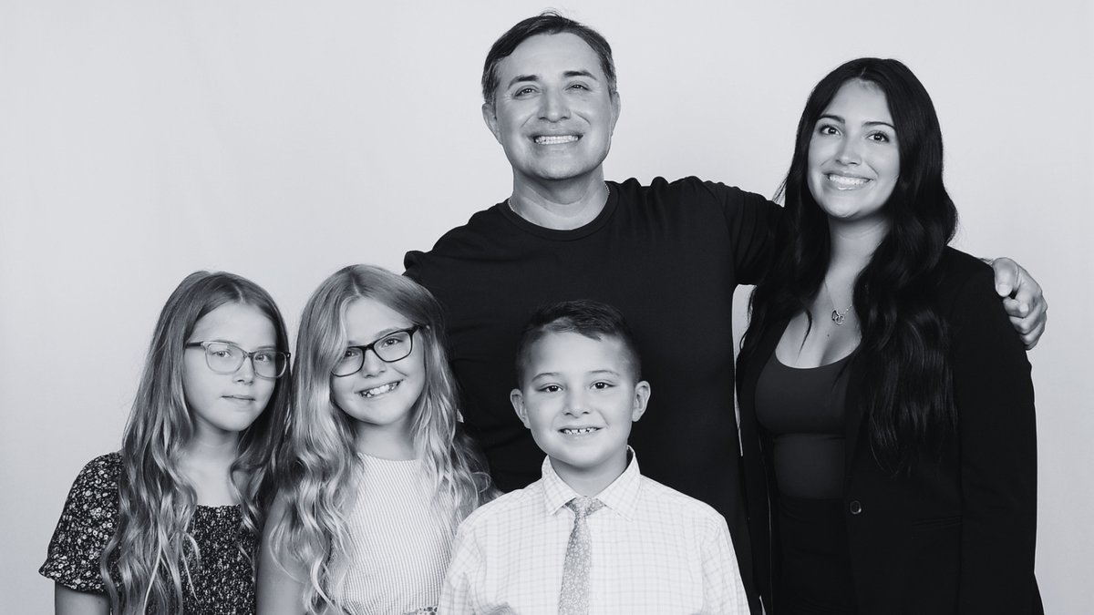 Victor Cuevas with his four children